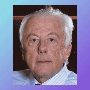 Unfocused elderly man with white hair and blue shirt, portrait, serious expression.