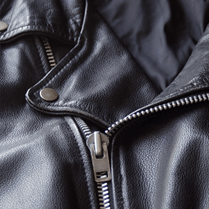 Black leather jacket closeup of zipper