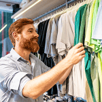 Male shopping for tshirts