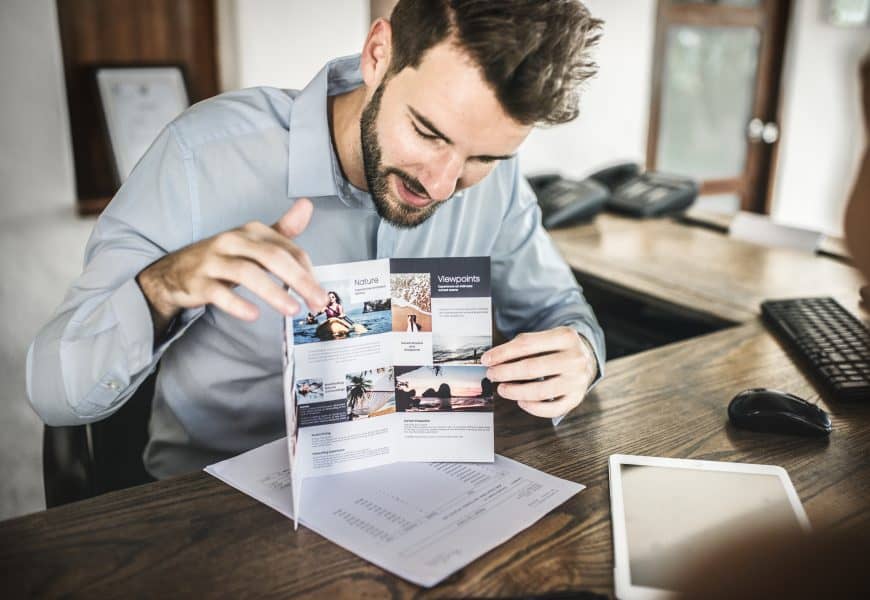 Brochure with colorful images printed for direct mail marketing campaigns.