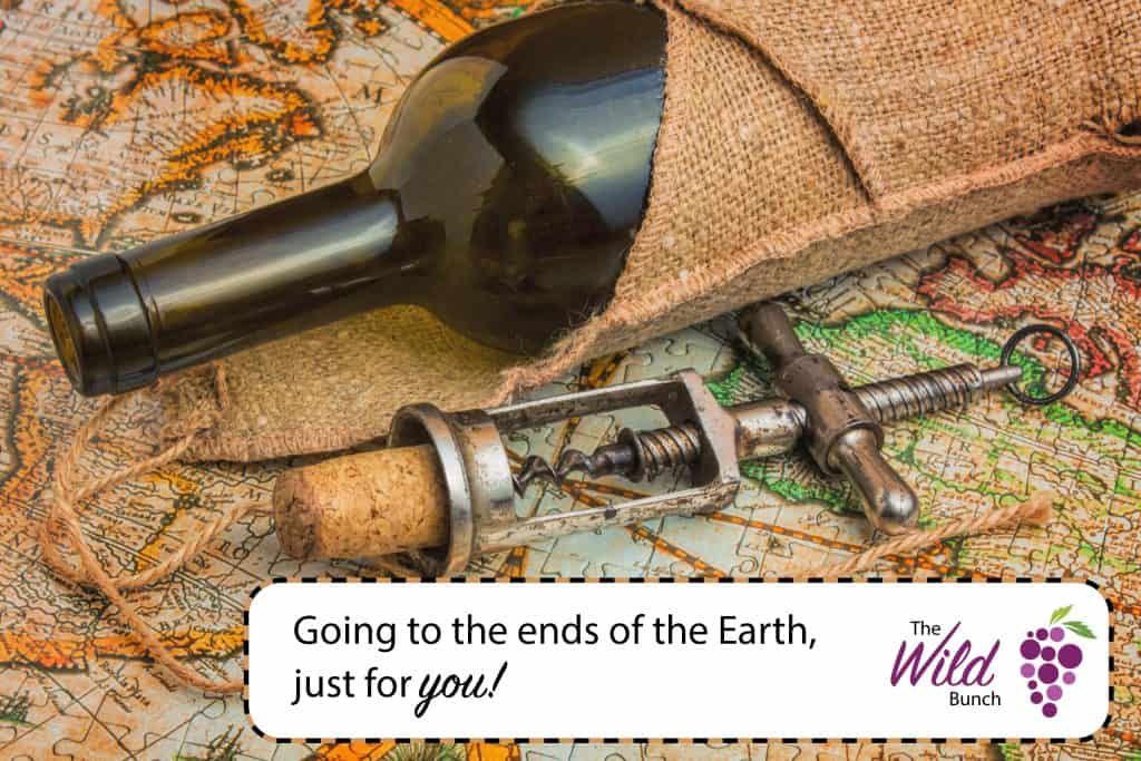 Vintage wine bottle with corkscrew on old map, representing direct mail and creative marketing strategies.