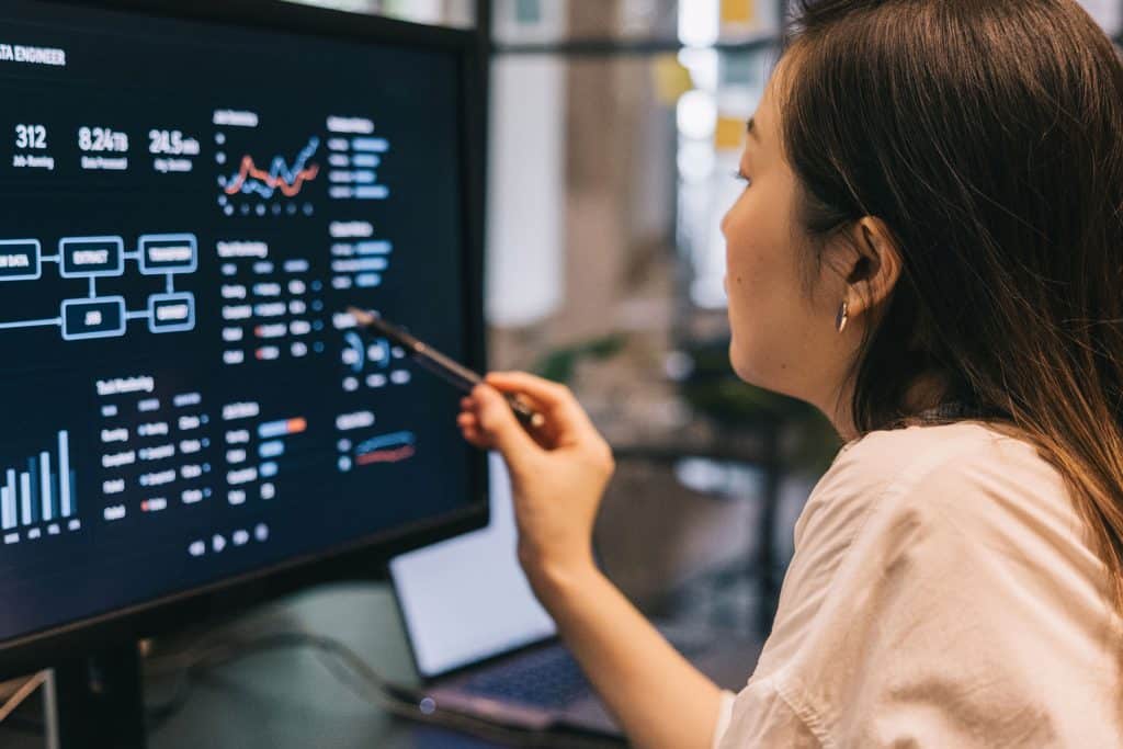 Data scientists analyzing first-party and third-party data to build direct mail audience insights